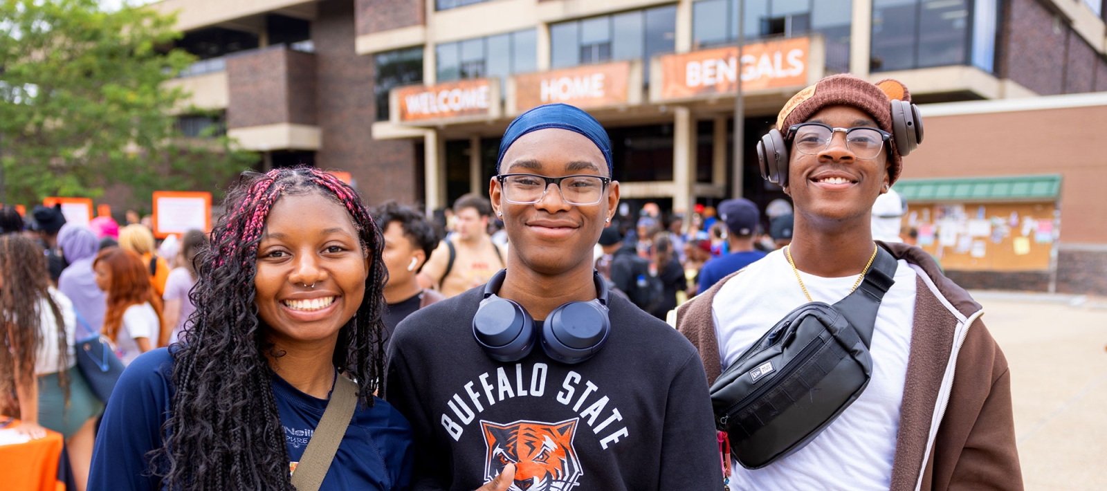 Three students in the plaza